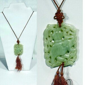 26" cord and carved serpentine necklace.